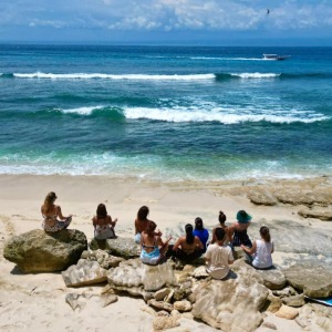 student-beach-meditation-during-our-200-hour-yoga-teacher-training-in-bali.