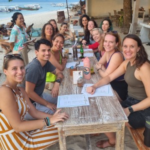 student-group-shot-during-an-evening-meal-on-our-200-hour-yoga-teacher-training-in-bali - we now have our 2026 program open