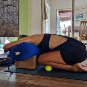 student-in-myoyin-anke-stretch-pose-during-our-200-hour-yoga-teacher-training-in-bali from akirayoga