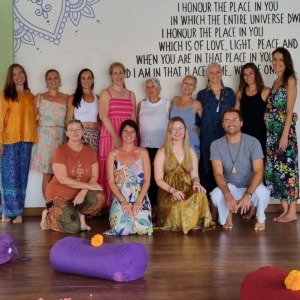 student-celebrating-their-graduation-in-our-yin-yoga-teacher-training-50-hour-program-in-bali