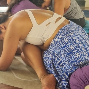 student-demonstrating-a-shoelace-variation-in-our-yin-yoga-teacher-training-50-hour-program-in-bal