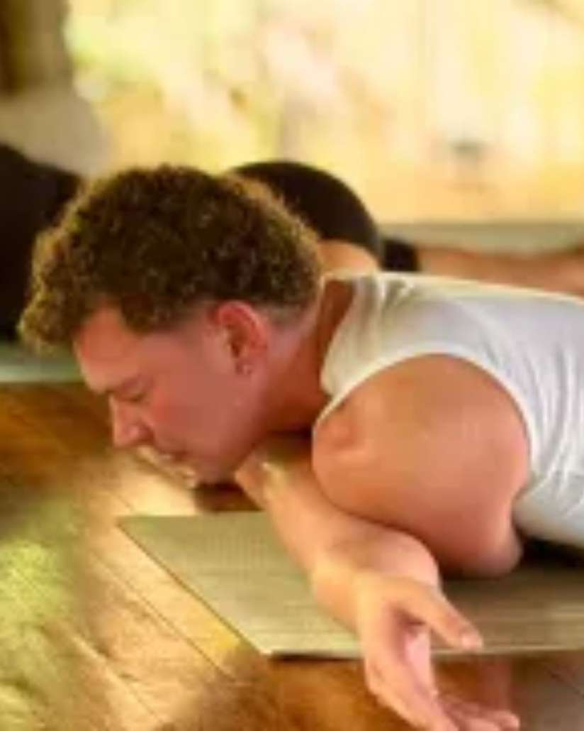 Student practising yoga inside a light-filled shala on Nusa Lembongan, part of a peaceful yoga studio for hire in Bali